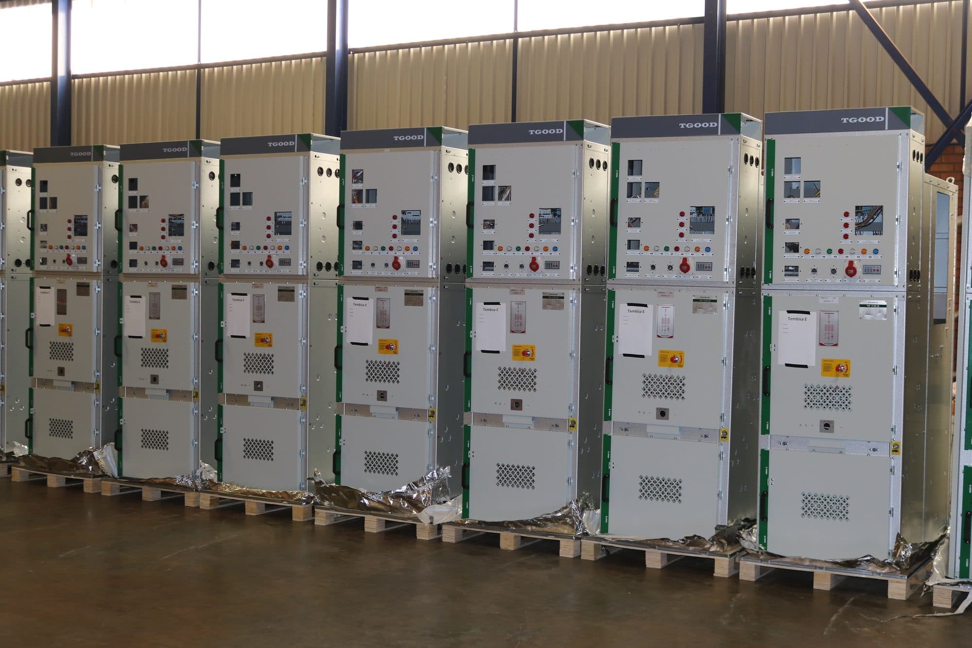 Switchgear panels installed in a row on a new building floor